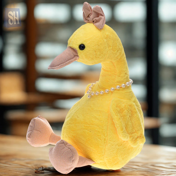 ديزي دازل™ – دمية بطة أنيقة»