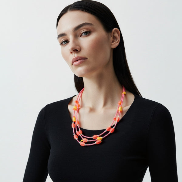 قلادة من الخرز على شكل غروب الشمس الناري